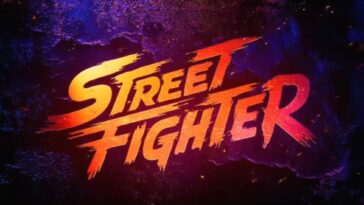 Logotipo oficial de Street Fighter O Filme 2026, com letras estilizadas em gradiente amarelo, laranja e vermelho, sobre um fundo de concreto escuro com iluminação de neon azul e roxo e faíscas.